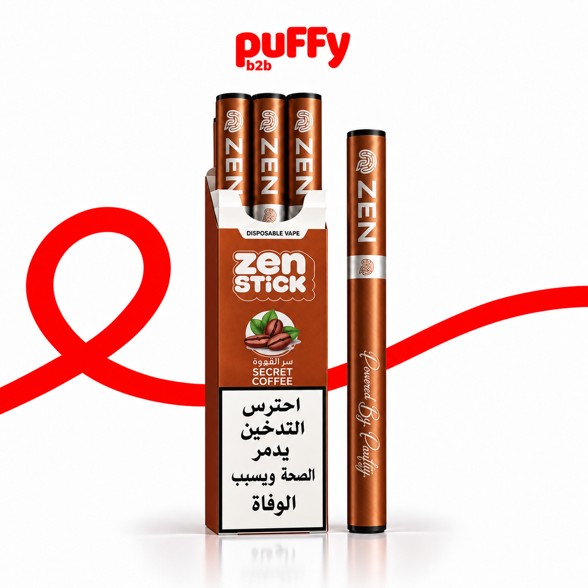 A box and single disposable vape pen of Puffy b2b Zen Stick in Secret Coffee flavor, shown on a white background with a red ribbon graphic and Arabic warning label.
