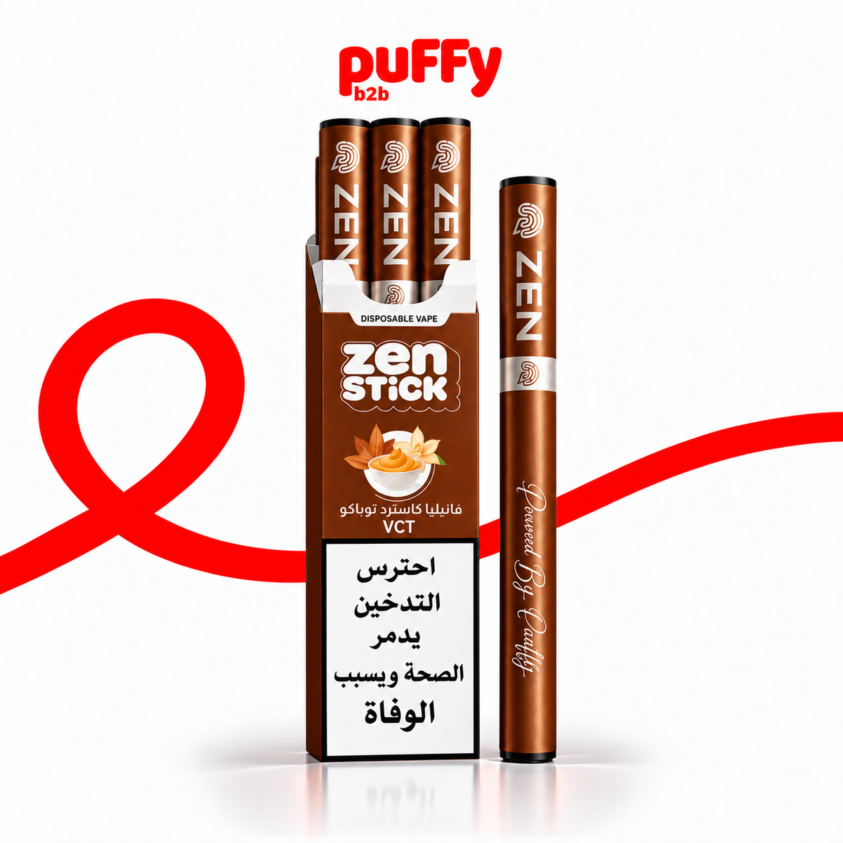 A box of Puffy b2b Zen Stick disposable vape devices alongside a single vape pen, both in brown packaging with white and gold details, on a white background with a red ribbon graphic.